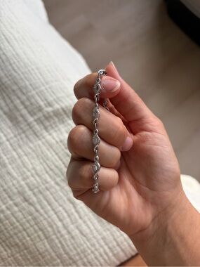 Zales Sterling Silver 1/10 CTW Diamond Twist Infinity Bracelet